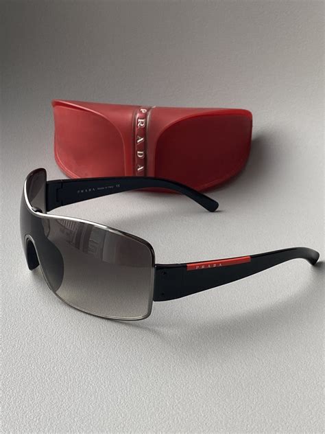 PRADA SPS50E Sunglasses in color 5AV301 